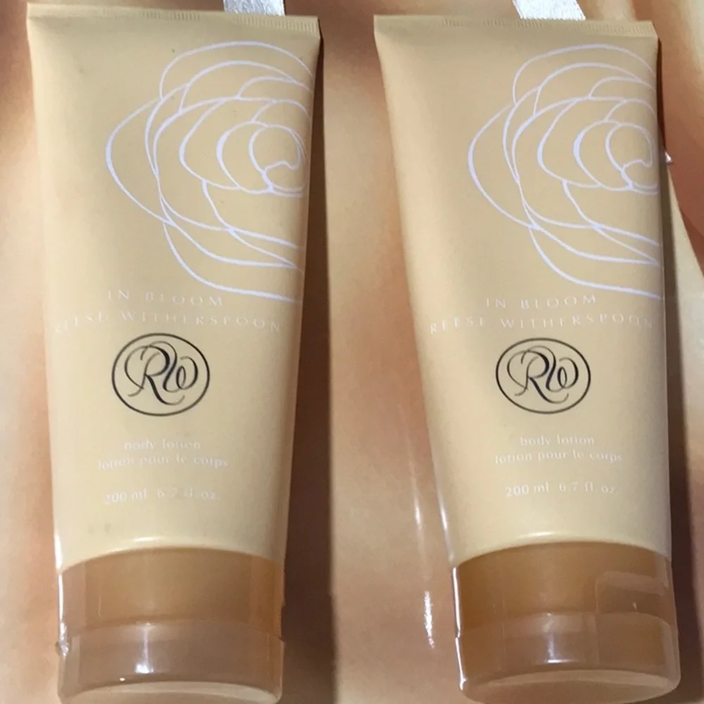 NEW sealed 2 AVON Reese Witherspoon In Bloom lotions 2 matching gift bags